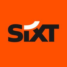 Schriftzug sixt schwarz auf orangefarbenem Hintergrund
