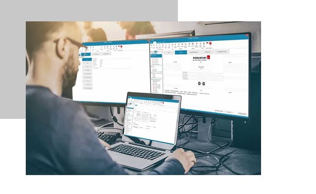 A man is working on questionnaire programming.