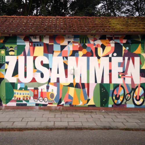 Wandgraffiti mit dem Schriftzug Zusammen