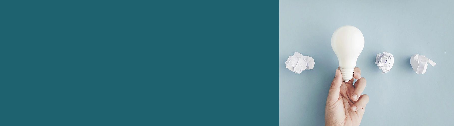 Person mit Gluehbirne