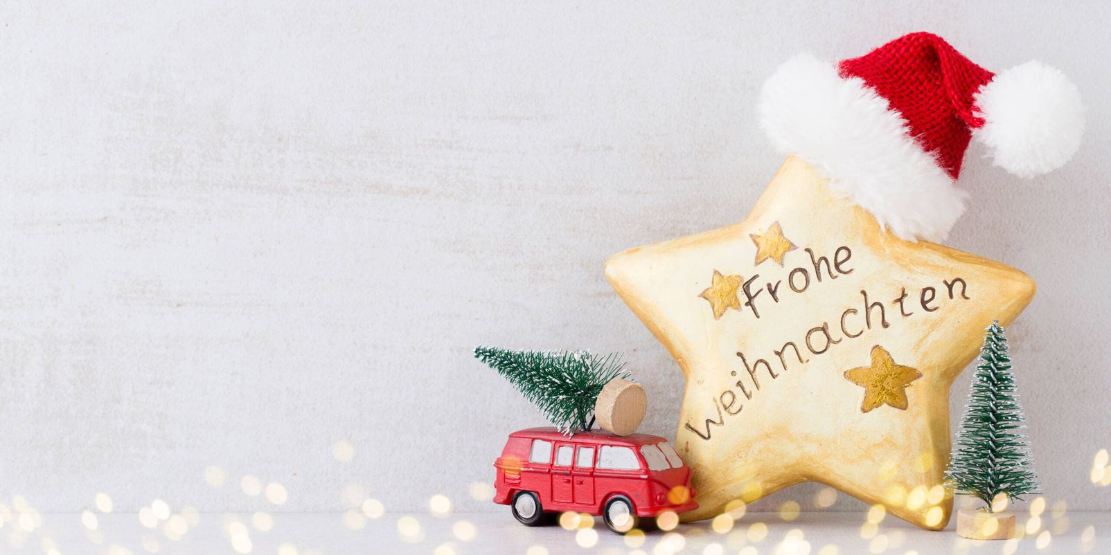 Christmas greeting card. Festive decoration on gray background. New Year concept. Copy space.  Flat lay. Top view.