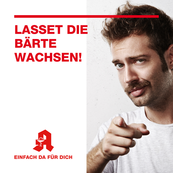 Ein Mann mit Oberlippenbart schaut smart in die Kamera. Links der Schriftzug "Lasset die Bärte wachsen!"
