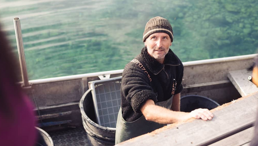 Fischer im Fischerboot