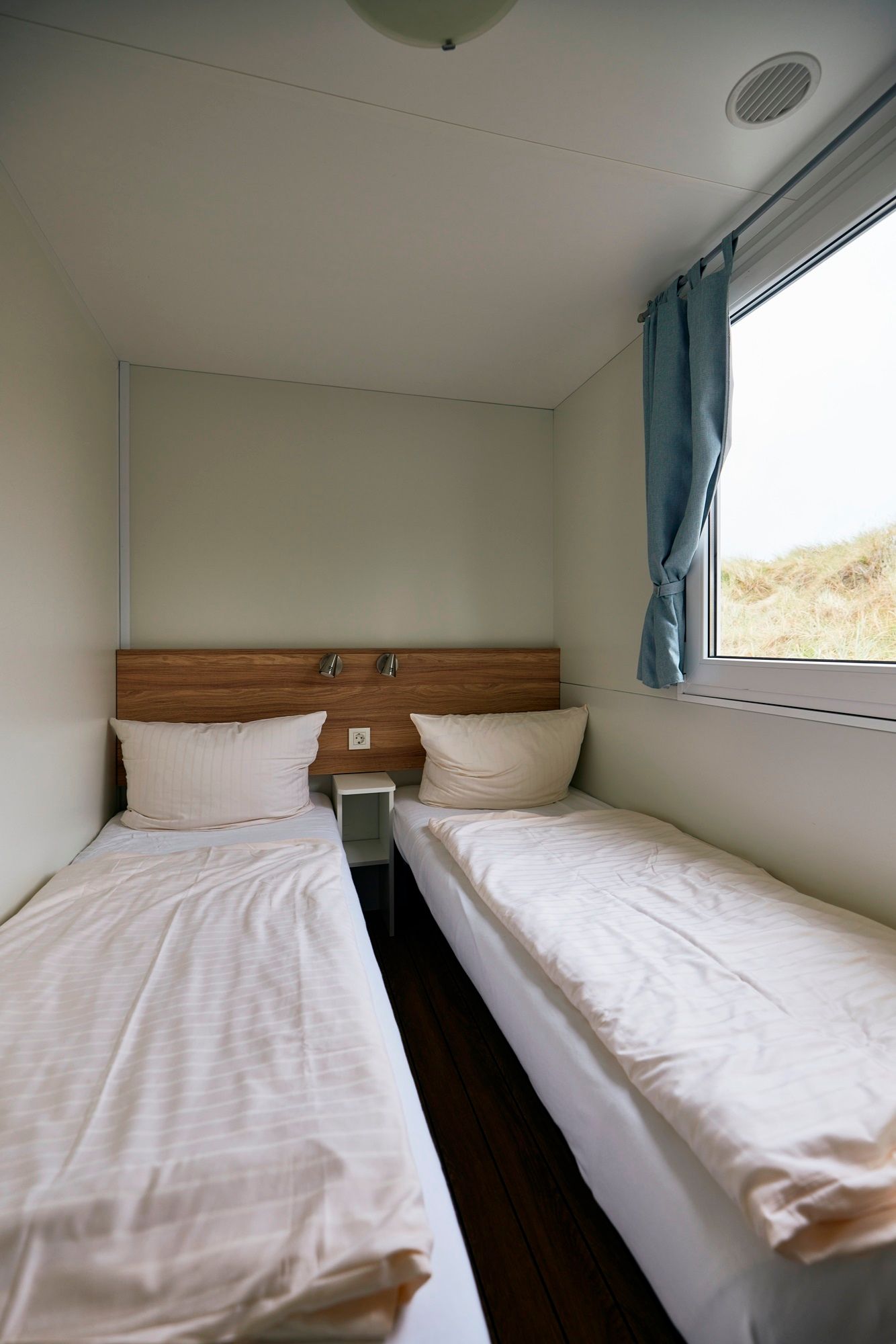 Einzelbetten im Familienmobilheim auf dem Campingplatz Westerland