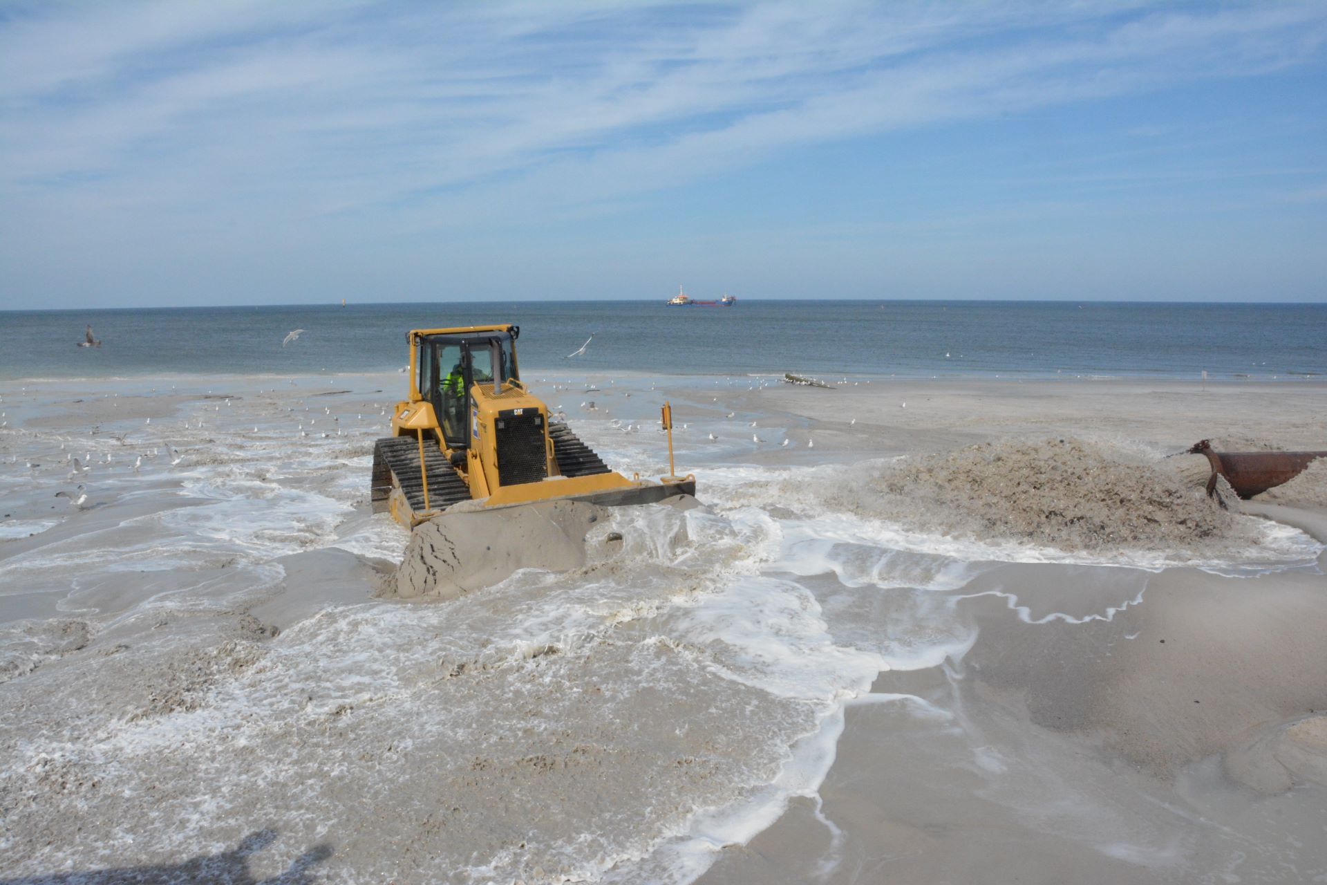 Bagger bei der Sandaufspülung