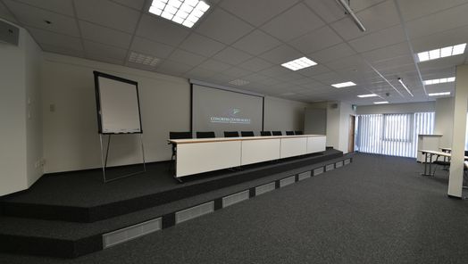 Raum Andreas Dirks in Westerland - Podest und Raum parlamentarisch bestuhlt